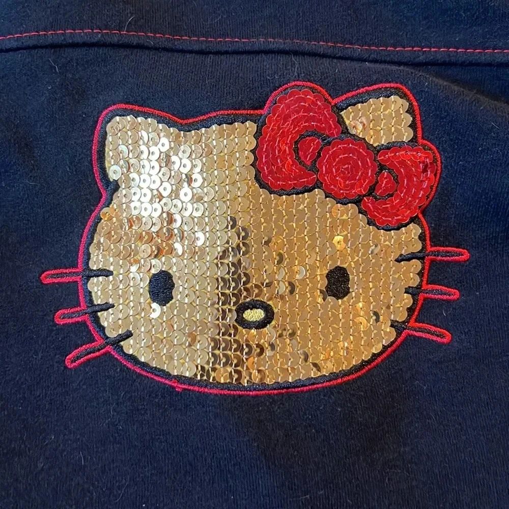 Sanrio Hello Kitty black and red zip up jacket. Sequin hello kitty back. Size 6